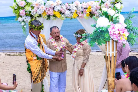 The lei exchange with the family watching