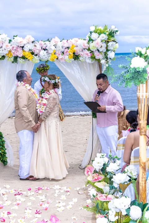 The officiant reading a blessing for the couple