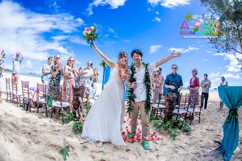 Guests cheer as Toshi and Suzanne are pronounced husband and wife