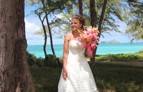 Close-up of the bright pink and orange tropical bouquet