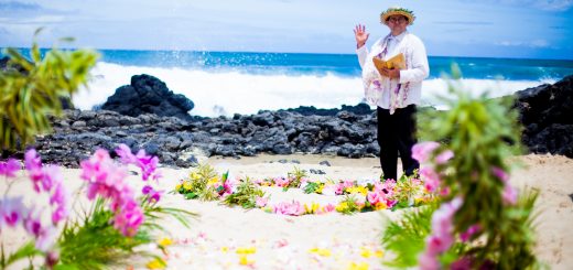 Kahu Paul facilitates a wedding ceremony on the beach at Makapuu