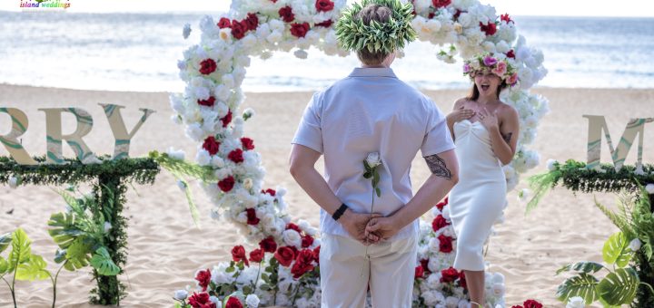 holding a white rose to give to his love